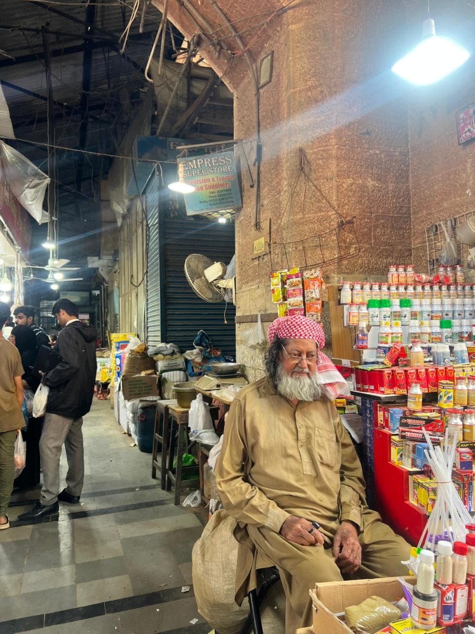 A vendor at his stall inside Empress Market