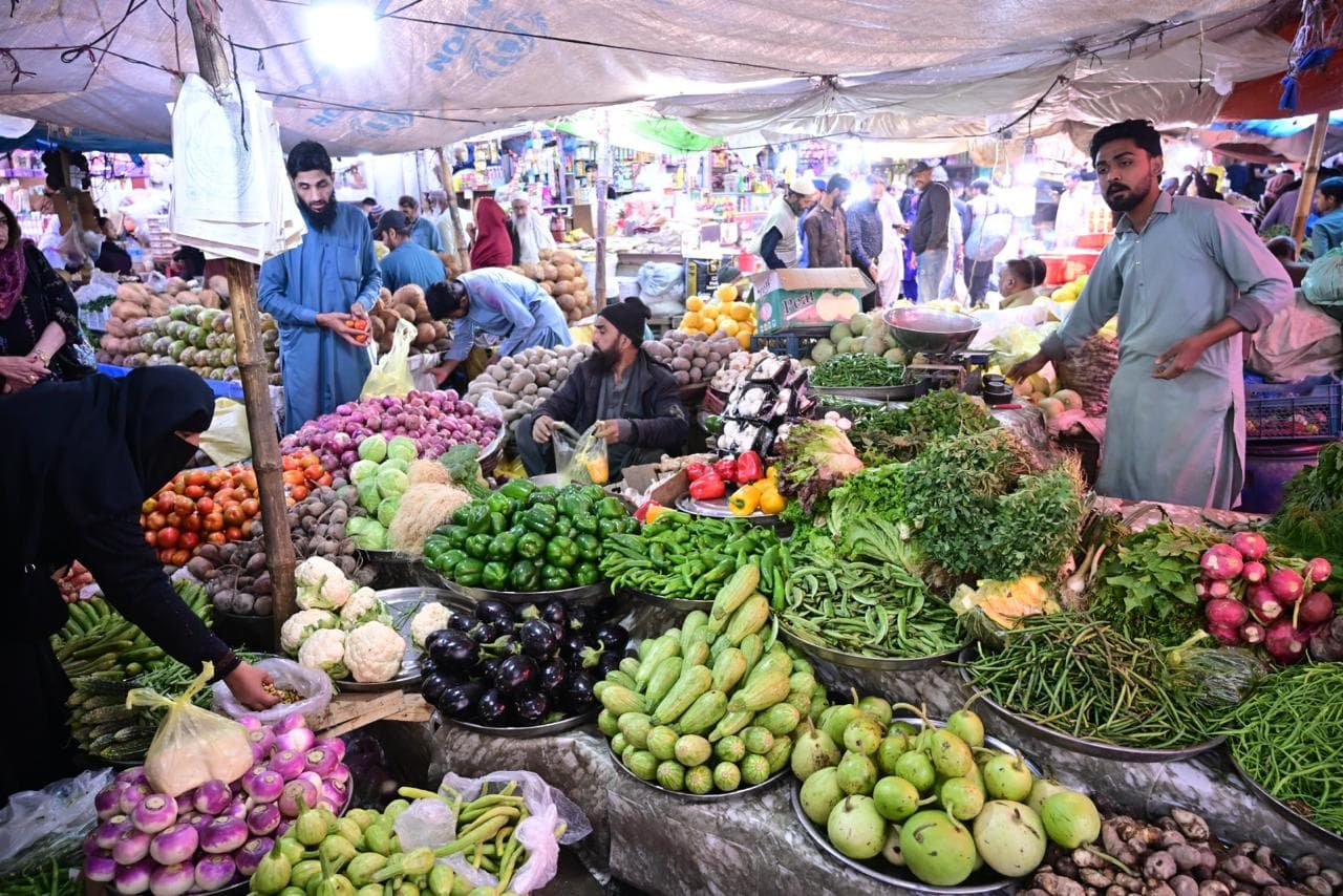 Vegetable stall piled high with fresh produce