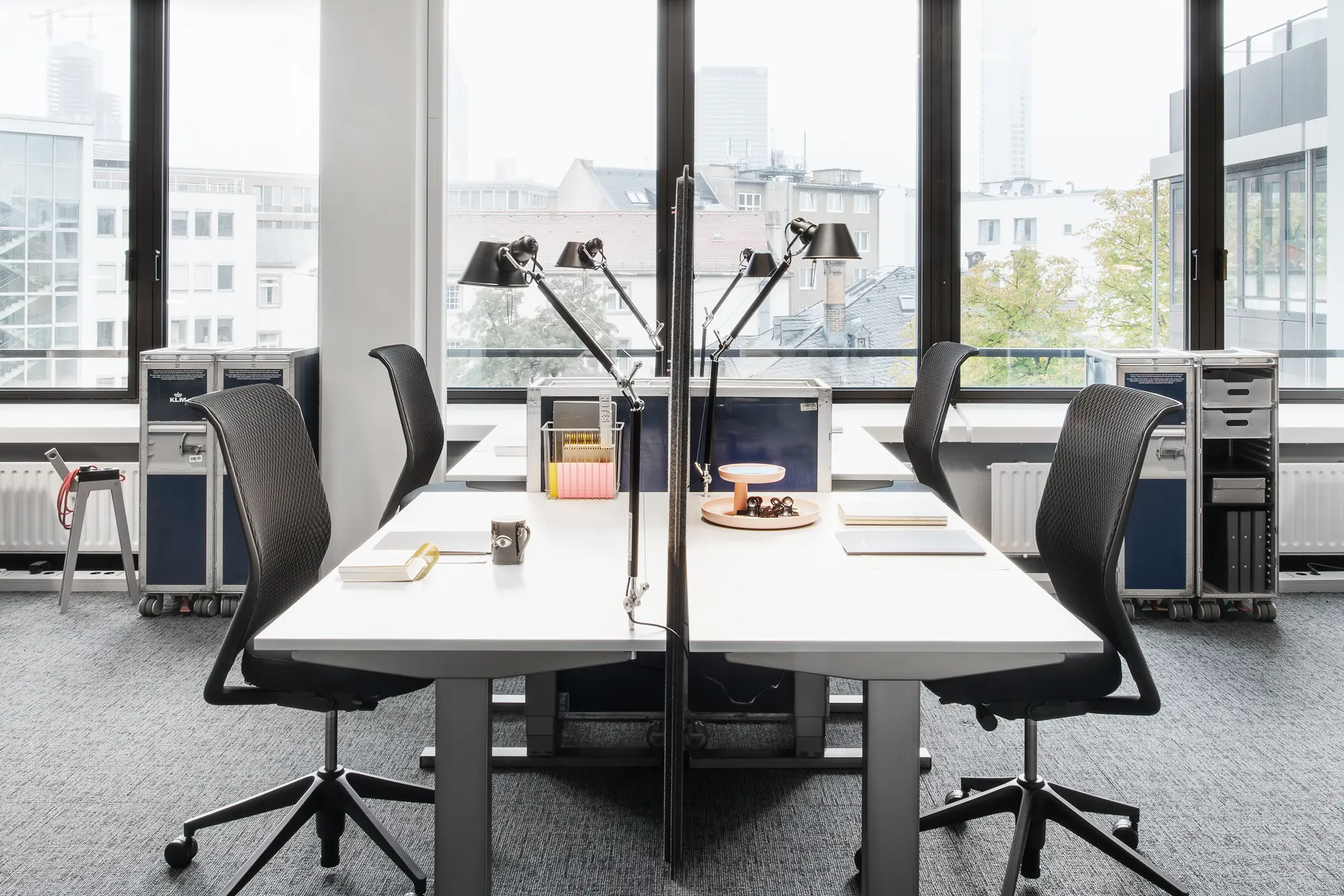 Modern co-working office space with floor-to-ceiling windows